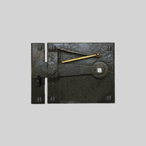 Shown as left hand with a dark wax iron finish.